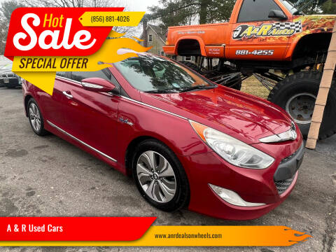 2013 Hyundai Sonata Hybrid for sale at A & R Used Cars in Clayton NJ
