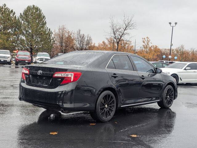 2014 Toyota Camry for sale at Axio Auto Boise in Boise, ID