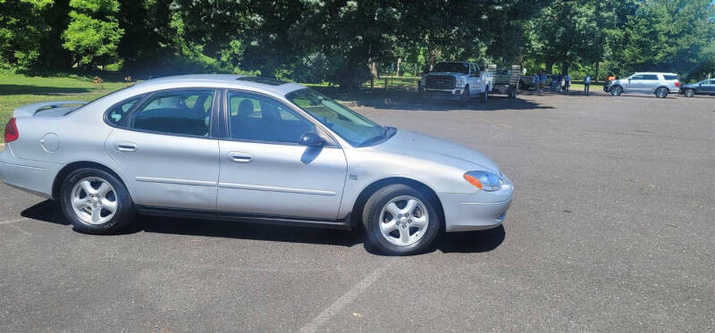 2003 Ford Taurus for sale at T CAR CARE INC in Philadelphia PA