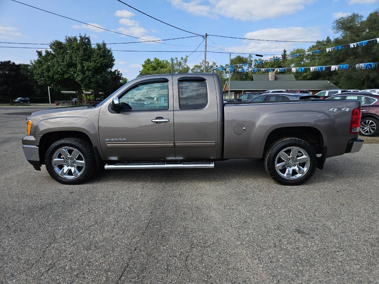 2013 GMC Sierra 1500 for sale at DANGO AUTO SALES in HOWARD CITY, MI