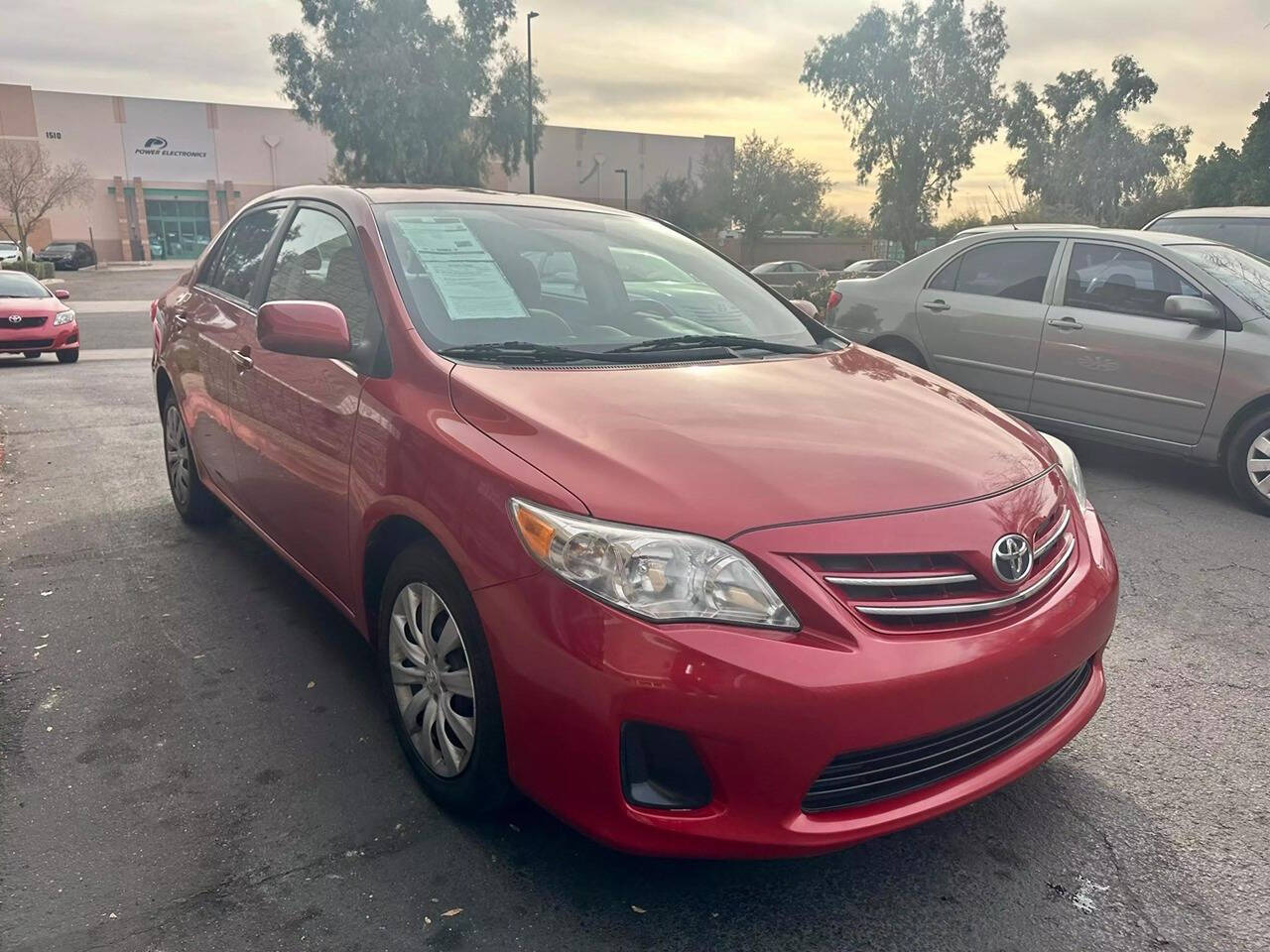 2013 Toyota Corolla for sale at HUDSONS AUTOS in Gilbert, AZ