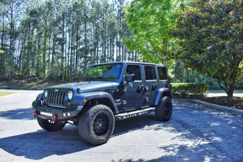 2007 Jeep Wrangler Unlimited for sale at Greystone Motors in Birmingham AL