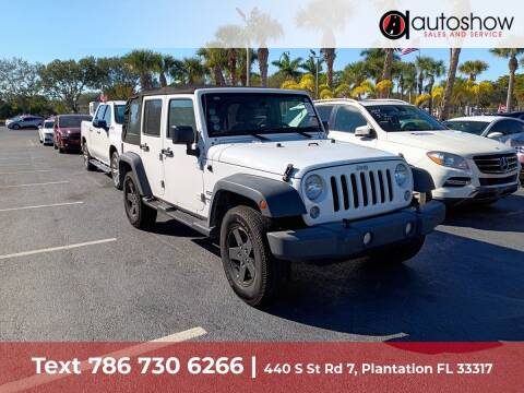 2015 Jeep Wrangler Unlimited for sale at AUTOSHOW SALES & SERVICE in Plantation FL