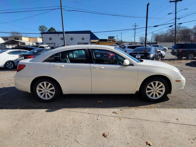 2010 Chrysler Sebring for sale at DAGO'S AUTO SALES LLC in Dalton, GA