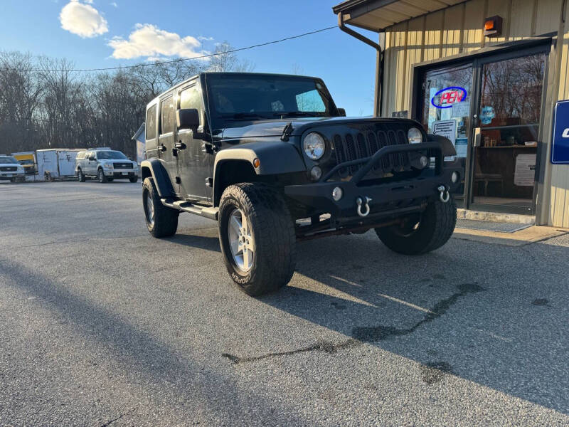 2014 Jeep Wrangler Unlimited for sale at Desmond's Auto Sales in Colchester CT