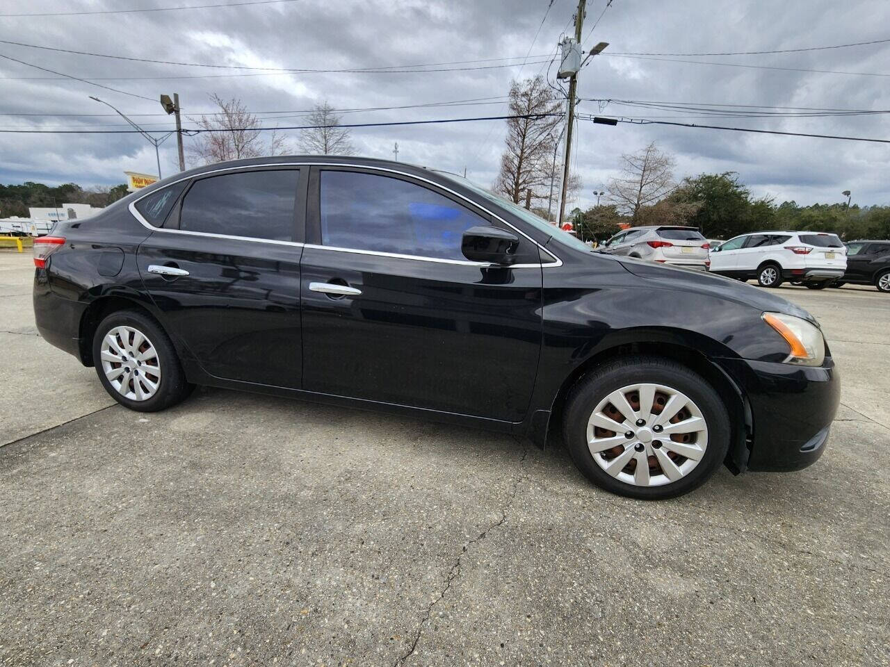 2013 Nissan Sentra for sale at Small Town Auto in Picayune, MS