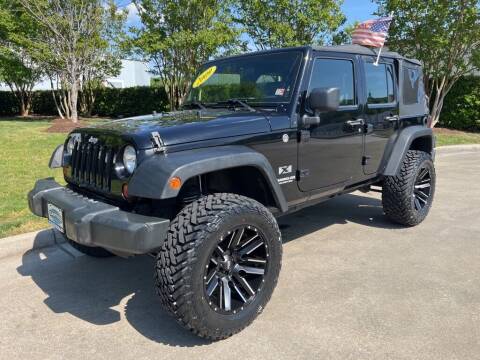 2009 Jeep Wrangler Unlimited for sale at UNITED AUTO WHOLESALERS LLC in Portsmouth VA