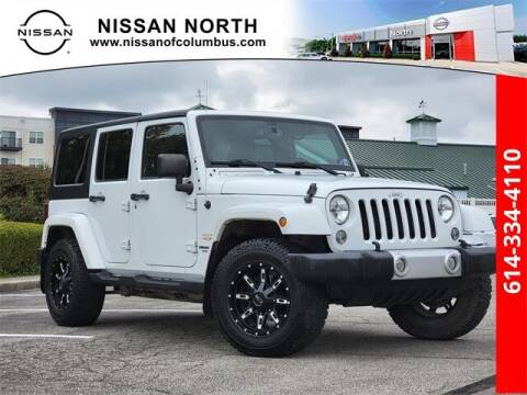 2015 Jeep Wrangler Unlimited for sale at Auto Center of Columbus in Columbus OH
