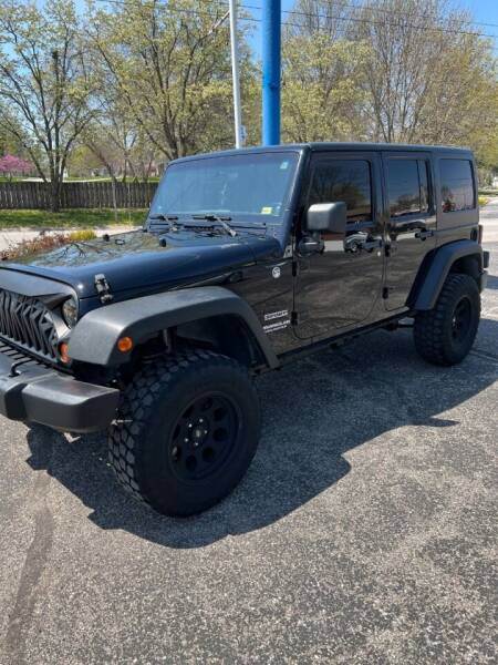 2012 Jeep Wrangler Unlimited for sale at Teds Auto Inc in Marshall MO