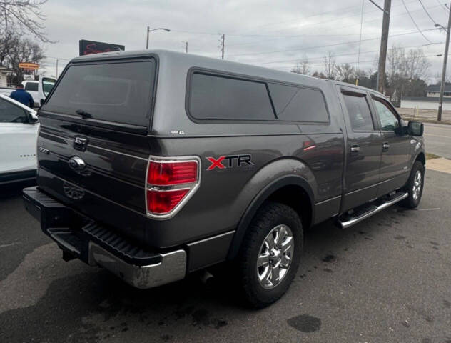 2014 Ford F-150 for sale at SIGNATURE AUTOS LLC in Weston, WI