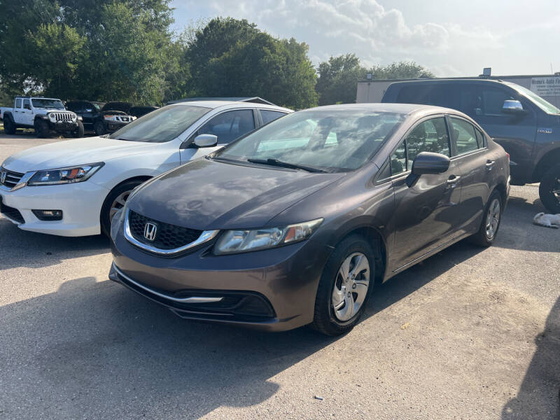 2014 Honda Civic for sale at Memo's Auto Sales in Houston TX