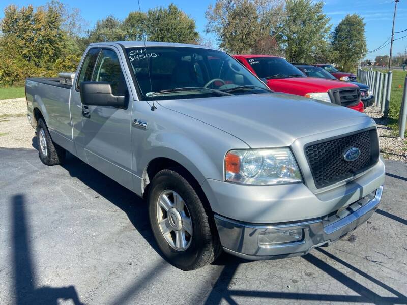 2004 Ford F-150 for sale at HEDGES USED CARS in Carleton MI