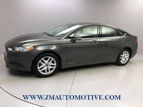 2015 Ford Fusion for sale at J & M Automotive in Naugatuck CT