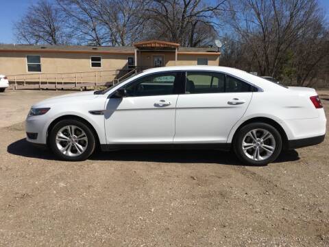 2016 Ford Taurus for sale at R and L Sales of Corsicana in Corsicana TX