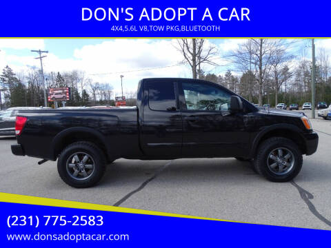 2014 Nissan Titan for sale at DON'S ADOPT A CAR in Cadillac MI
