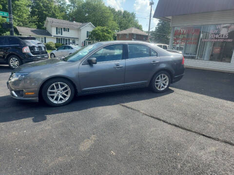 2012 Ford Fusion for sale at Maximum Auto Group II INC in Cortland OH