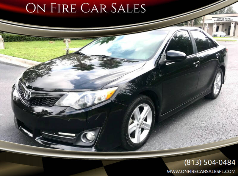 2014 Toyota Camry for sale at On Fire Car Sales in Tampa FL