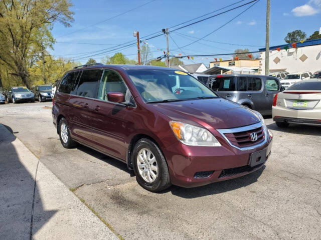 2010 Honda Odyssey for sale at DAGO'S AUTO SALES LLC in Dalton, GA