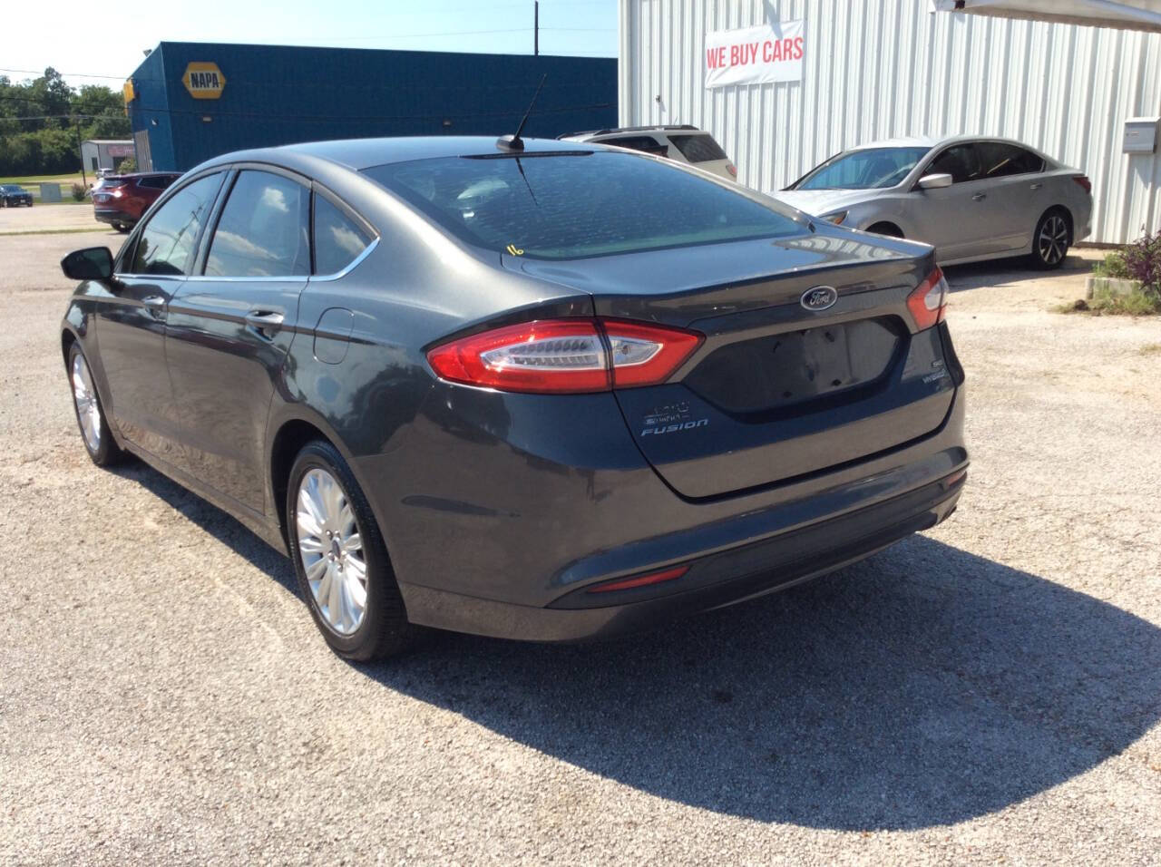 2016 Ford Fusion Hybrid for sale at SPRINGTIME MOTORS in Huntsville, TX