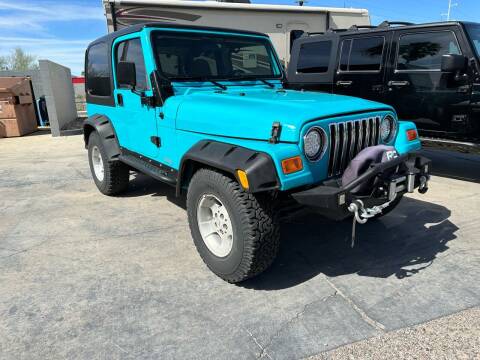 2000 Jeep Wrangler for sale at TANQUE VERDE MOTORS in Tucson AZ