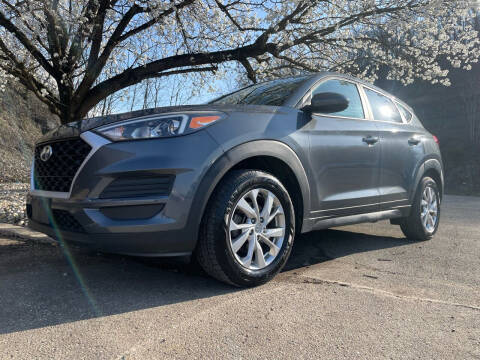 2019 Hyundai Tucson for sale at Jim's Hometown Auto Sales LLC in Cambridge OH