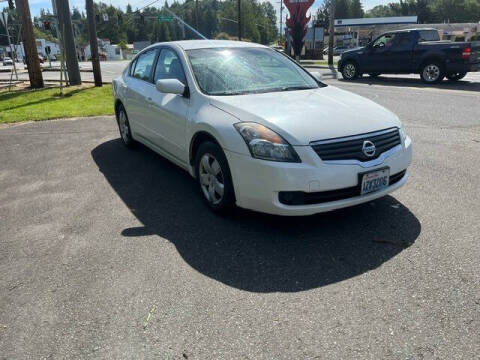 2009 Nissan Altima for sale at MILLENNIUM MOTORS INC in Monroe WA