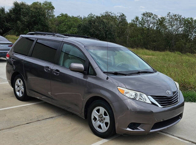 2013 Toyota Sienna for sale at CAR MARKET AUTO GROUP in Sugar Land, TX