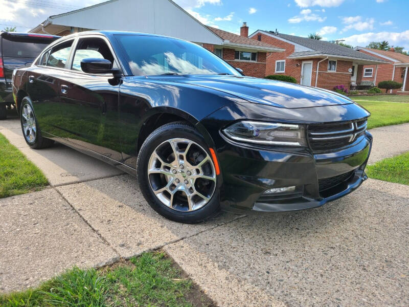 2015 Dodge Charger for sale at Dymix Used Autos & Luxury Cars Inc in Detroit MI