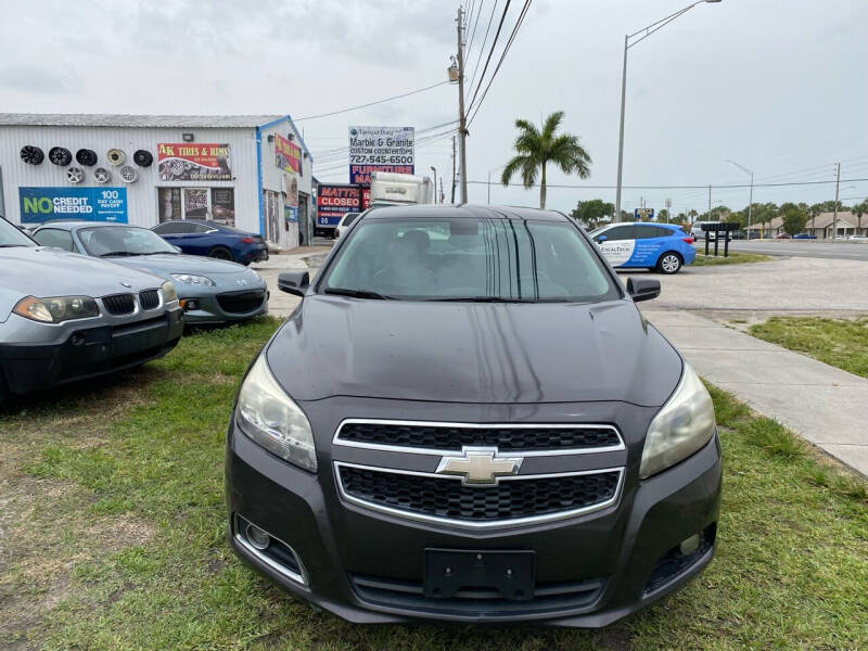 2013 Chevrolet Malibu for sale at ONYX AUTOMOTIVE, LLC in Largo FL