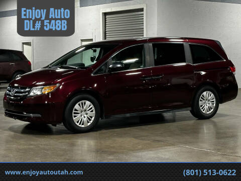 2014 Honda Odyssey for sale at Enjoy Auto  DL# 548B - Enjoy Auto DL# 548B in Midvale UT