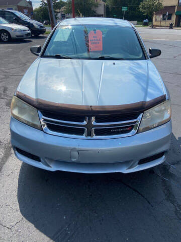 2013 Dodge Avenger for sale at North Hill Auto Sales in Akron OH