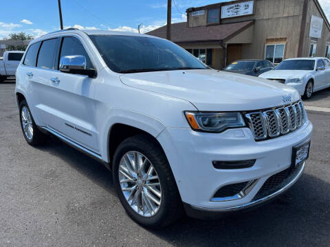 2017 Jeep Grand Cherokee for sale at BERKENKOTTER MOTORS in Brighton CO