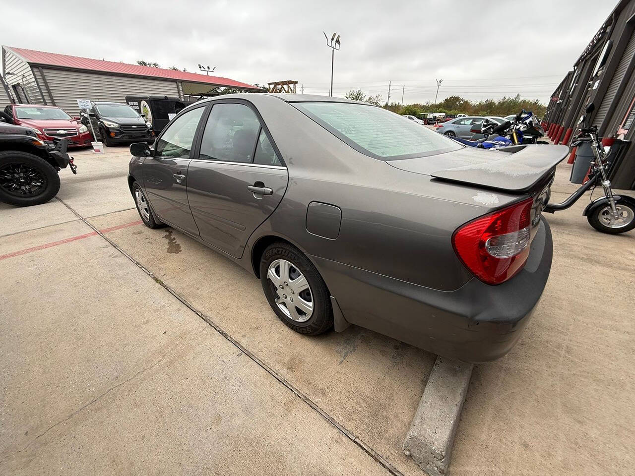 2004 Toyota Camry for sale at Chrome Auto in Houston, TX