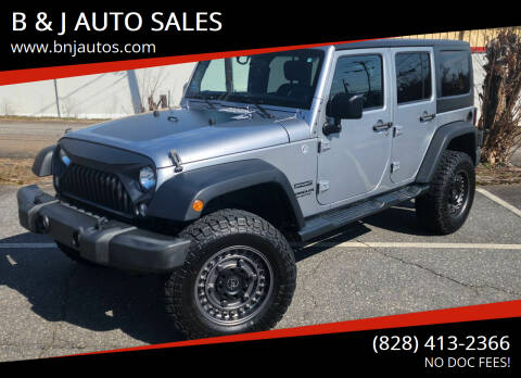 2014 Jeep Wrangler Unlimited for sale at B & J AUTO SALES in Morganton NC