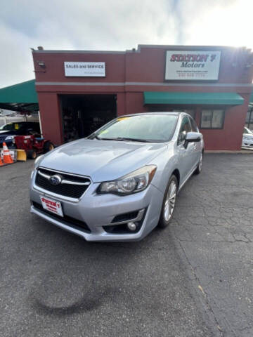 2015 Subaru Impreza for sale at A & J AUTO GROUP in New Bedford MA