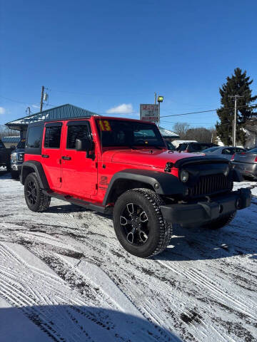 2013 Jeep Wrangler Unlimited for sale at Sam's Autos LLC in Bellefontaine OH