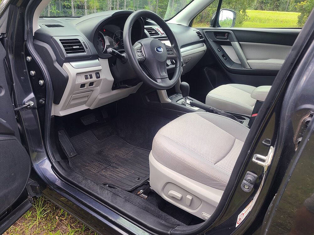 2014 Subaru Forester for sale at Flagler Auto Center in Bunnell, FL