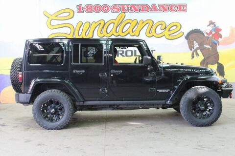 2013 Jeep Wrangler Unlimited for sale at Sundance Chevrolet in Grand Ledge MI