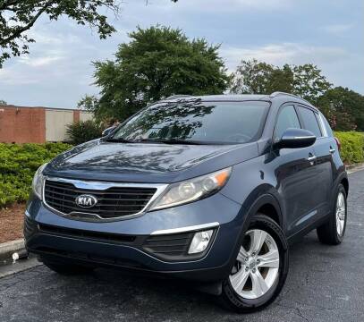 2013 Kia Sportage for sale at William D Auto Sales - Duluth Autos and Trucks in Duluth GA