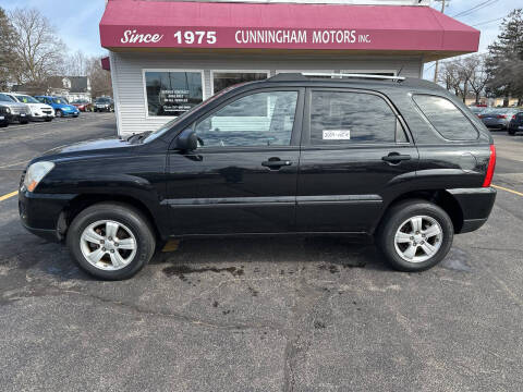 2009 Kia Sportage for sale at Cunningham Motor Sales, Inc. in Urbana IL