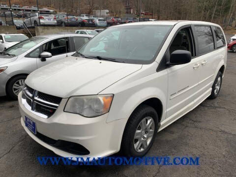 2012 Dodge Grand Caravan for sale at J & M Automotive in Naugatuck CT