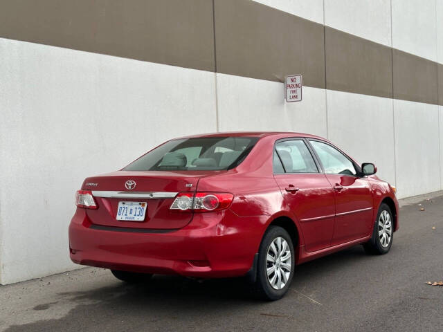 2013 Toyota Corolla for sale at Phoenix Motor Co in Romulus, MI