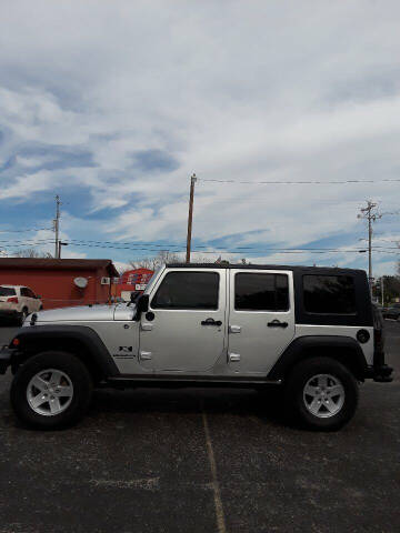2009 Jeep Wrangler Unlimited for sale at Rons Auto Sales in Stockdale TX