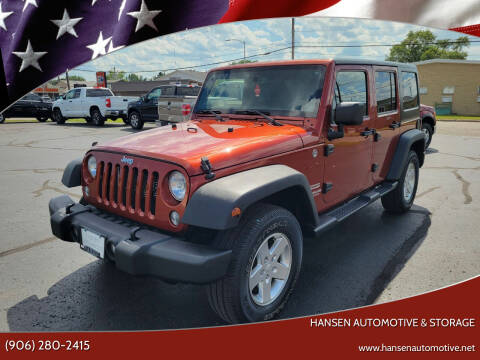 2014 Jeep Wrangler Unlimited for sale at Hansen Automotive & Storage in Escanaba MI