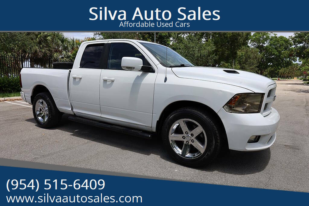 2011 RAM 1500 Sport 4x4 4dr Quad Cab 6.3 ft. SB Pickup's photo