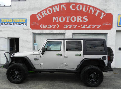 2012 Jeep Wrangler Unlimited for sale at Brown County Motors in Russellville OH