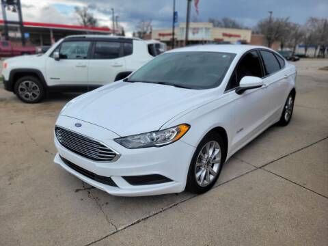 2017 Ford Fusion Hybrid for sale at Madison Motor Sales in Madison Heights MI