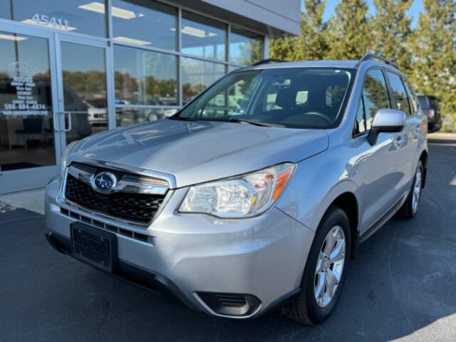 2015 Subaru Forester for sale at Opus Motorcars in Utica, MI