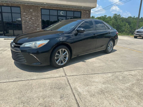 2015 Toyota Camry for sale at WHOLESALE AUTO GROUP in Mobile AL
