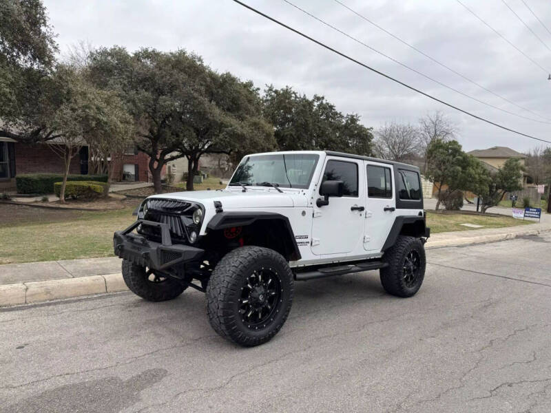 2015 Jeep Wrangler Unlimited for sale at First Gear Automotive in San Antonio TX